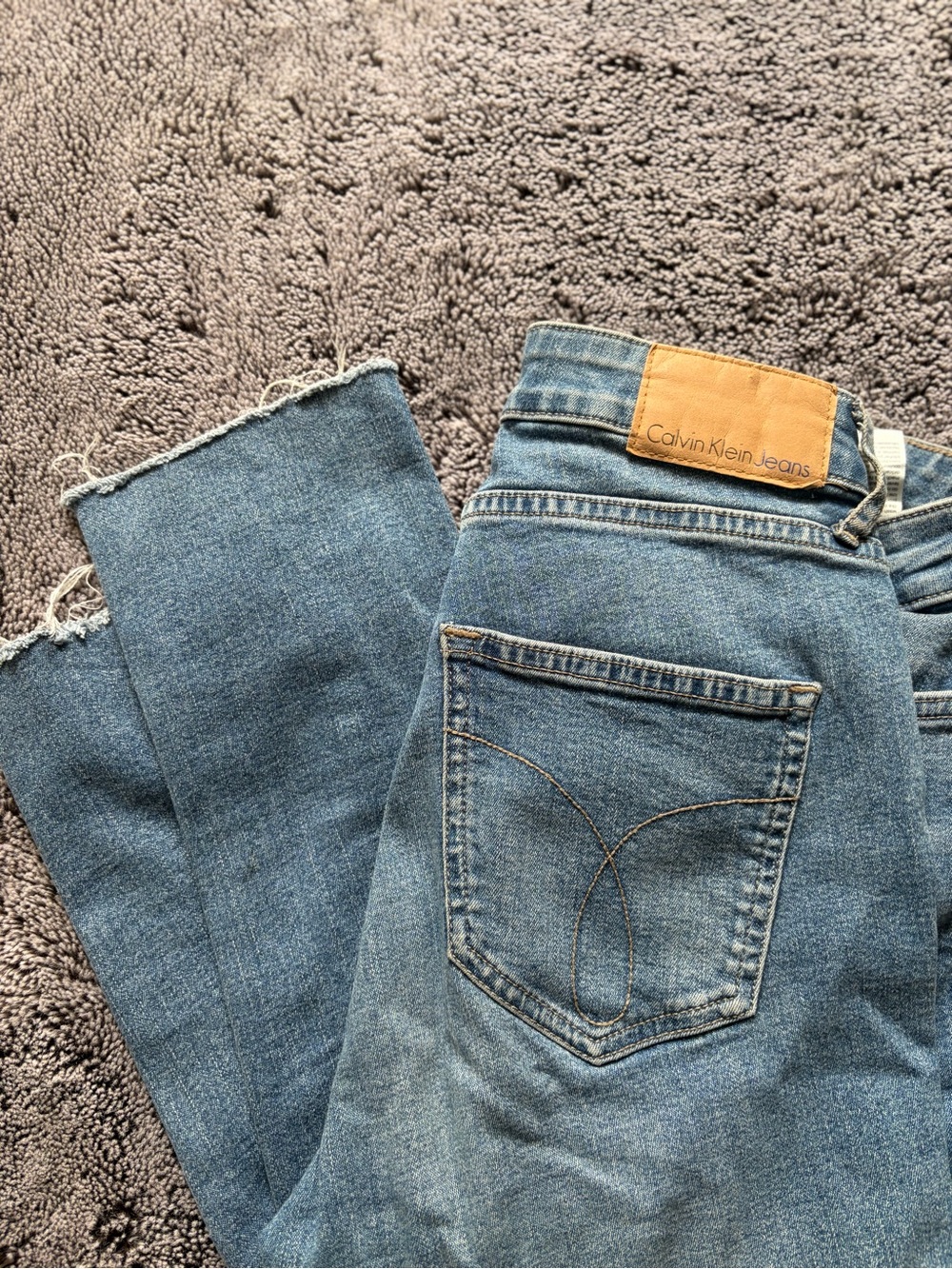 Calvin Klein Jeans Women’s Straight Ripped Hem Jeans